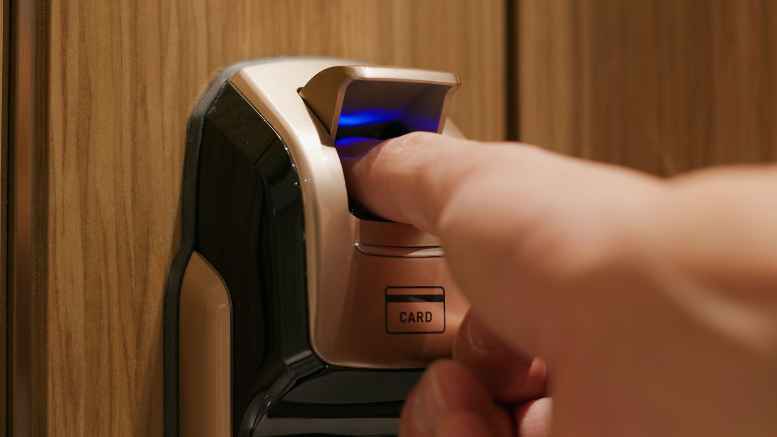 Biometric fingerprint reader installed on office door in Singapore